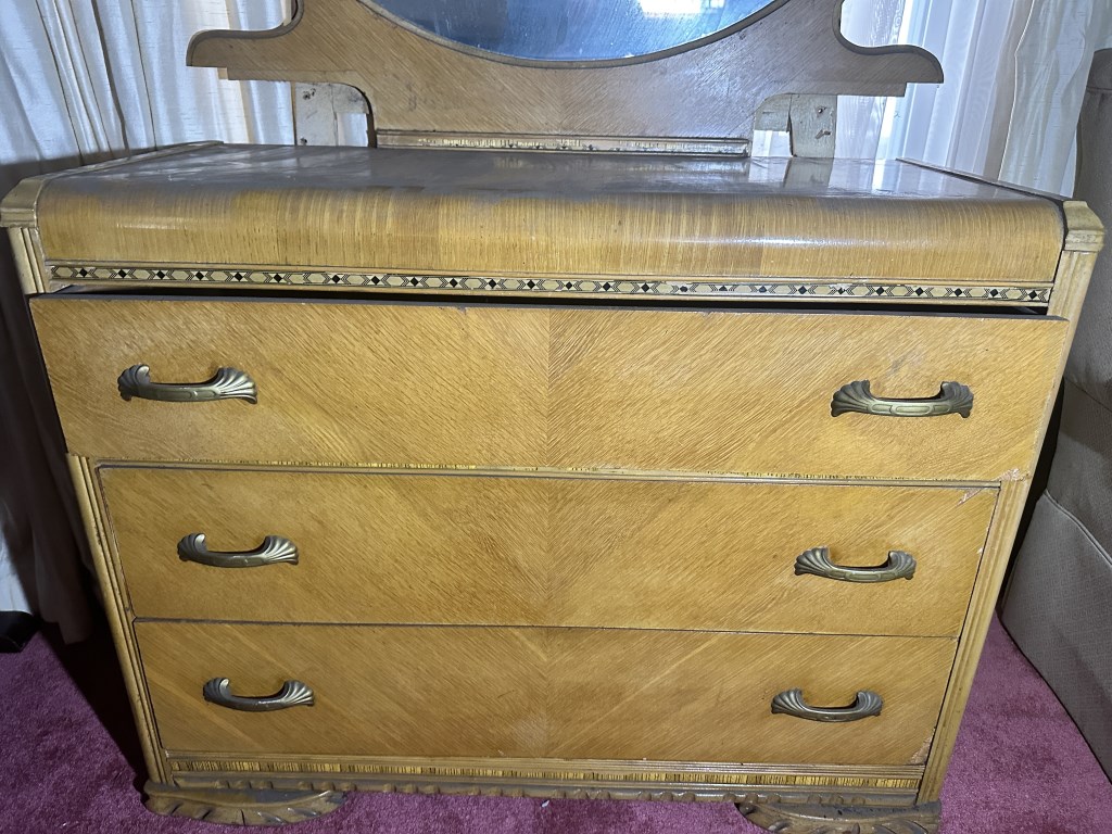 Vintage Waterfall Dresser With Mirror 3-drawer dresser with large round mirror and decorative trim