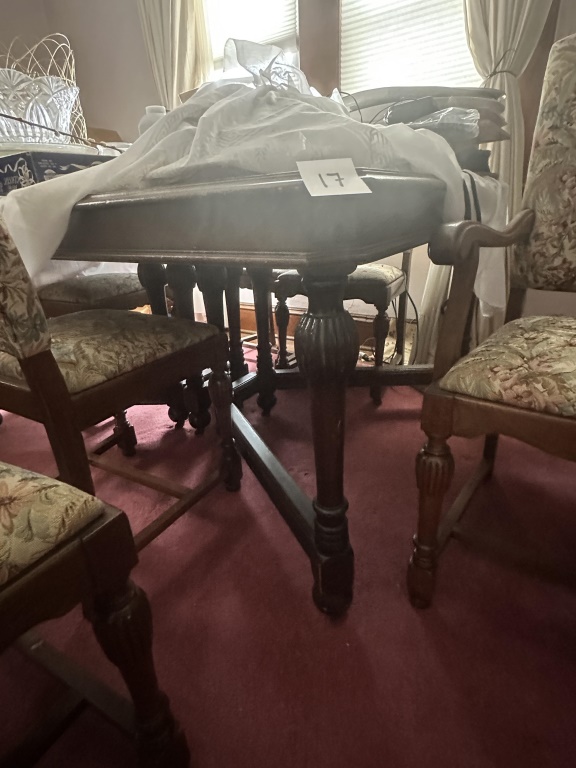 Dining Table With 6 Upholstered Chairs dining table with 6 upholstered chairs. 3 table leaves included. Table measures approx 60"x45