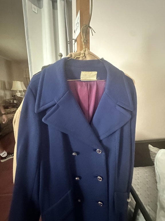 Coat Rack with Misc Coats