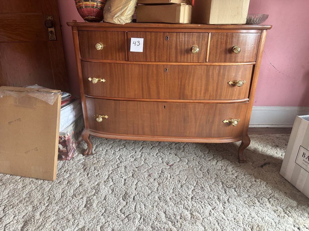 Wood Dresser wood dresser with 2 large drawers, 3 small upper drawers, brass-tone pulls, and curved front. Approx 45" Long