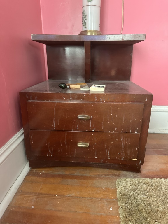 Pair Of Mid-Century Era Nightstands matching pair of wood nightstands with 2 drawers and open shelf area. Contents not included