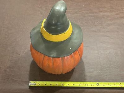 Ceramic Halloween Witch Hat Pumpkin Decoration. Painted ceramic pumpkin decoration topped with a 