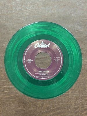 The Beatles “Nowhere Man” Green 45 RPM Record. Capitol S7-18894 jukebox-only record on 