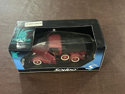 Solido Prestige Die-Cast Vintage Truck. Boxed red vintage-style die-cast truck with black 