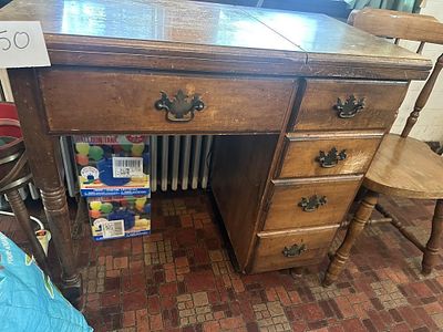 Wooden Sewing Machine Desk. with built in sewing machine. Untested. All contents included