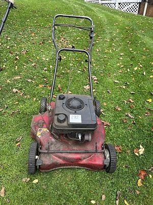 Tecumseh Premier Walk-Behind Lawn Mower. Vintage red steel-deck walk-behind push lawn mower 