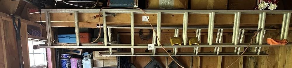Lot 185: 2 Aluminum Extension Ladders