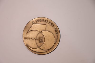 An official commemorative medal marking 50 years of the State of Israel, issued by the 
