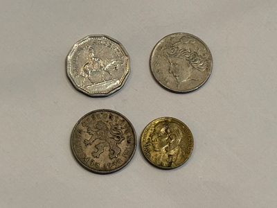 A collection of coins from various countries around the world.