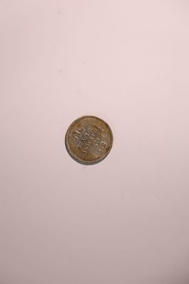 A 50 mil coin from the British Mandate for Palestine, dated 1935. 
Silver coin.