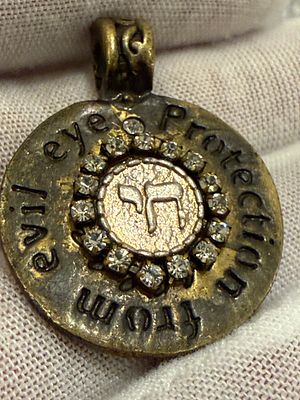 A “Chai” (חי) pendant. 
Material not tested.