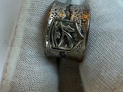 Wide decorative ring featuring the Eye of Horus—an ancient Egyptian symbol associated with 