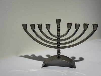 Modern signed tabletop Hanukkah menorah with nine branches (including the shamash), made of 