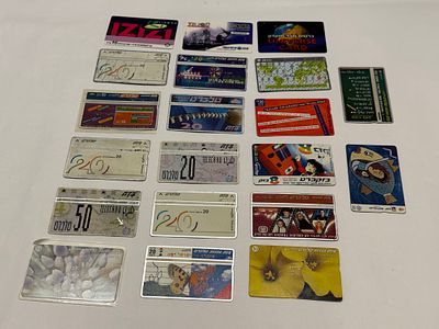 לוט של כרטיסי טלכרט ישראליים (Telecard), מגוון רחב של עיצובים ונושאים – פרסומות, דמויות 