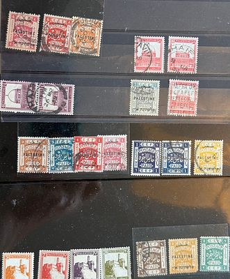 Lot of Palestine Mandate stamps from the British Mandate period, including early “Postage Paid” 