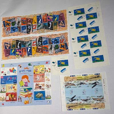 A visually spectacular and highly collectible group of Israeli souvenir and stamp sheets 