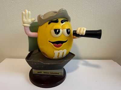 Vintage M&amp;M's "Yellow Columbus" collectible candy dispenser. This M&amp;M's brand dispenser 