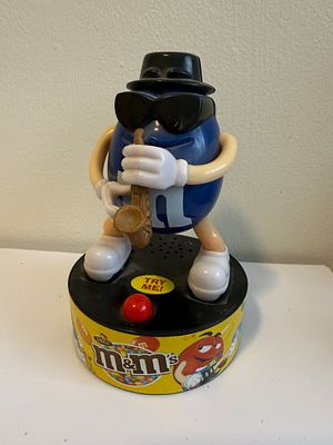 Vintage M&amp;M's "Blue" musician collectible – saxophone player on a sound base. The classic 