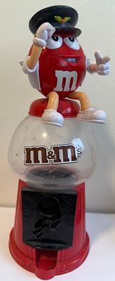 Vintage M&amp;M's gumball-style candy dispenser – Red character in a captain/conductor cap. 
