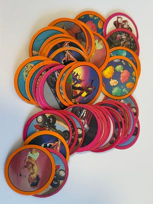 Lot of 40 vintage Israeli "POGIM" / "פוג אמיתי" milk-cap discs (POGs), 1990s. POGs were a 