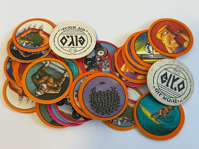 Lot of 30 vintage Israeli "POGIM" / "פוג אמיתי" milk-cap discs (POGs), 1990s. POGs were a 