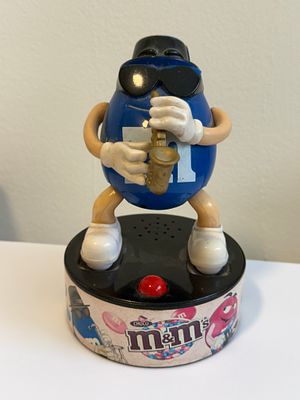 Vintage M&amp;M's "Blue" character collectible figure – saxophone-playing musician on a 