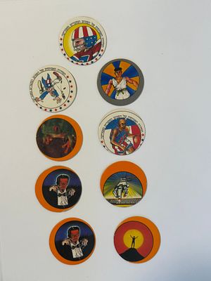 Lot of 9 vintage Israeli "POGIM" / "פוג אמיתי" milk-cap discs (POGs), 1990s. POGs were a hugely 