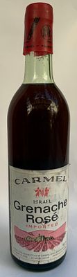 בקבוק יין ישן וסגור של "כרמל" — Grenache Ros&eacute; (גרנאש רוזה), תוצרת ישראל, יוצר ומבוקבק ע"י חברת 