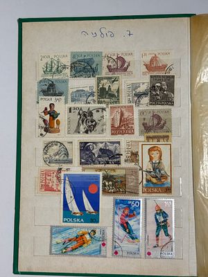 Worldwide stamp stockbook (green cover), organized by country. Strong Poland section (historic 