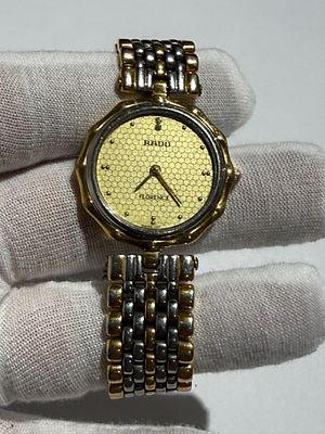 Rado “Florence” ladies wristwatch, Swiss made, featuring a gold-tone case with bi-color 