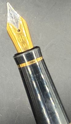 Daniel Hechter fountain pen with a pale champagne/pearl-colored lacquer body, gold-tone clip 
