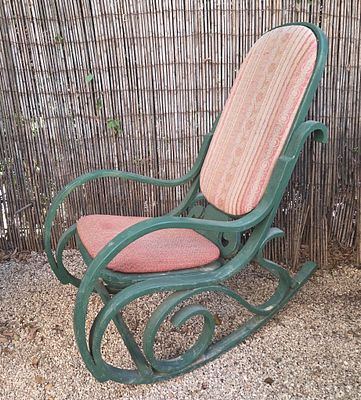 Classic bentwood rocking chair in the Thonet style, featuring the characteristic scrolled 