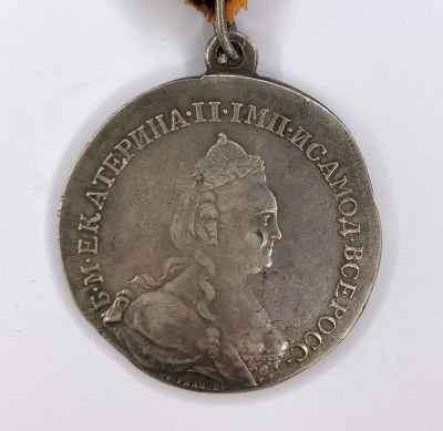 Medaille "F&uuml;r den Sieg &uuml;ber die T&uuml;rken bei Kinburn". Am Ordensband des Hl. Georgs. Russisches 