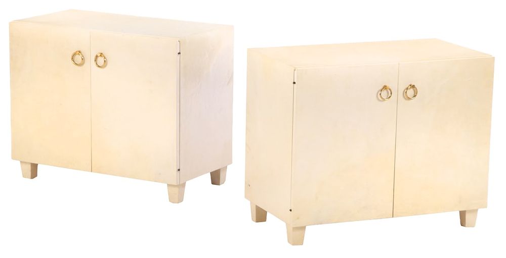 PAIR PARCHMENT COVERED TWO DOOR CABINETS WITH BRASS RING HARDWARE C 1950 IN THE MANNER OF. Pair 