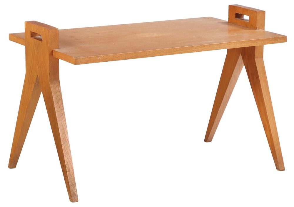 FRENCH OAK OCCASIONAL TABLE IN THE MANNER OF JACQUES ADNET C 1950. French oak occasional table 