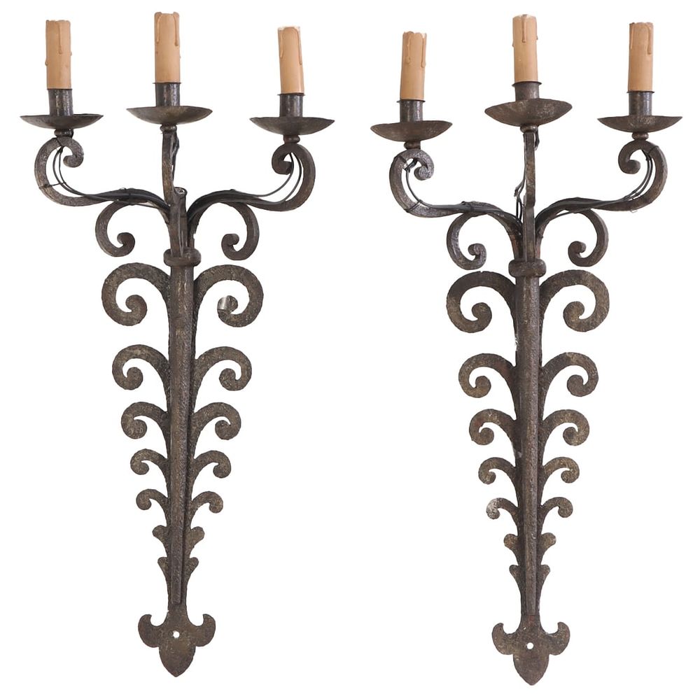PAIR FRENCH IRON THREE ARM WALL SCONCES IN THE MANNER OF JEAN ROYERE C 1950. Pair French iron 