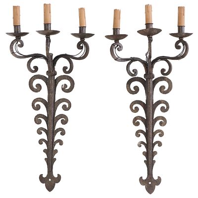 PAIR FRENCH IRON THREE ARM WALL SCONCES IN THE MANNER OF JEAN ROYERE C 1950. Pair French iron 