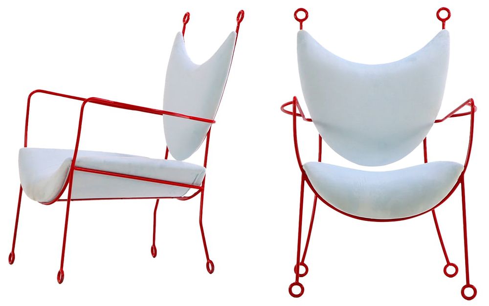 A FUN PAIR OF PAINTED IRON AND UPHOLSTERED ARM CHAIRS IN THE MANNER OF JEAN ROYERE. A fun pair 