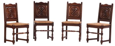 FOUR FRENCH OAK AND RUSH SIDECHAIRS WITH CIRCULAR MOTIFS IN THE MANNER OF CHARLES DUDOUYT C 1940. 
