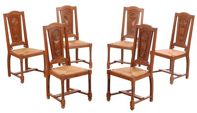 SIX FRENCH OAK AND RUSH DINING CHAIRS WITH GEOMETRIC MOTIFS IN THE MANNER OF CHARLES DUDOUYT. SIx 