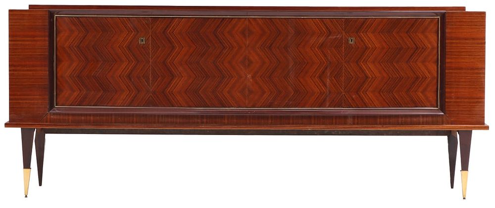 FRENCH ART DECO STYLE FOUR DOOR SIDEBOARD HAVING EXOTIC WOOD GRAIN AND A SYCAMORE INTERIOR C 1950. 