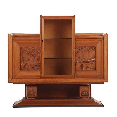FRENCH ART DECO OAK SIDEBOARD HAVING A CENTRAL GLASS DOOR FLANKED BY WOOD DOORS WITH CARVED BIRDS. 