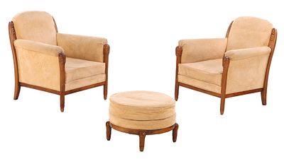 PAIR OF FRENCH CARVED MAHOGANY CLUB CHAIRS WITH MATCHING FOOT STOOL ATTRIBUTED TO SUE ET MARE C. 