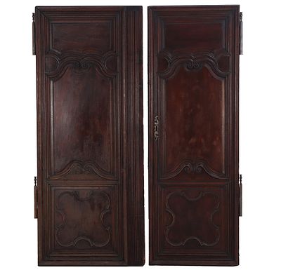 PAIR OF EARLY NINETEENTH CENTURY FRENCH WALNUT CABINET DOORS HAVING A LOCK AND KEY. Pair of 