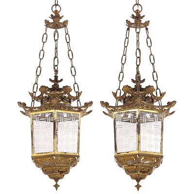 A PAIR OF BRASS AND ETCHED GLASS PAGODA FORM LANTERNS. A pair of brass and etched glass pagoda 