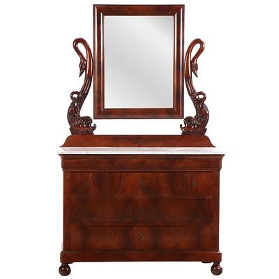 AN UNUSUAL CROTCH MAHOGANY FIVE DRAWER EMPIRE STYLE DRESSER HAVING DOLPHIN FORM SUPPORTS AND. An 