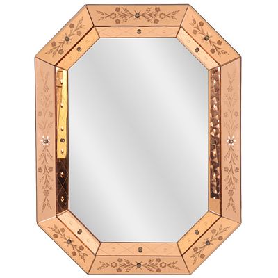 A PEACH COLORED AND ETCHED GLASS MIRROR CIRCA 1945. A peach colored and etched glass mirror 