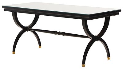 A HOLLYWOOD REGENCY STYLE EBONIZED COFFEE TABLE HAVING A MIRRORED TOP C 1940. A Hollywood 