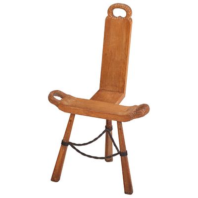 A FRENCH THREE LEG GOUGE CARVED CHAIR WITH IRON STRETCHER C 1960. A French three leg gouge 