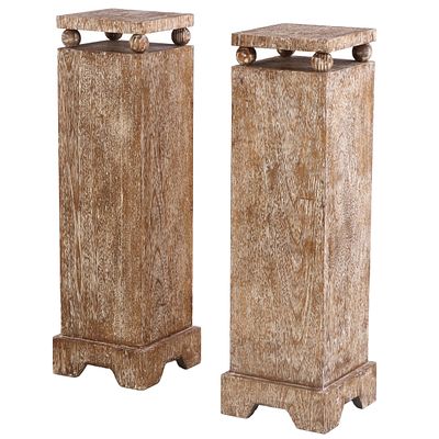 A PAIR CERUSED OAK PEDESTALS HAVING A TOP RAISED ON SPHERES. A pair cerused oak pedestals 